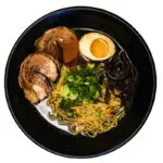 Shoyu ramen with soy-based broth, noodles, green onions, and traditional toppings